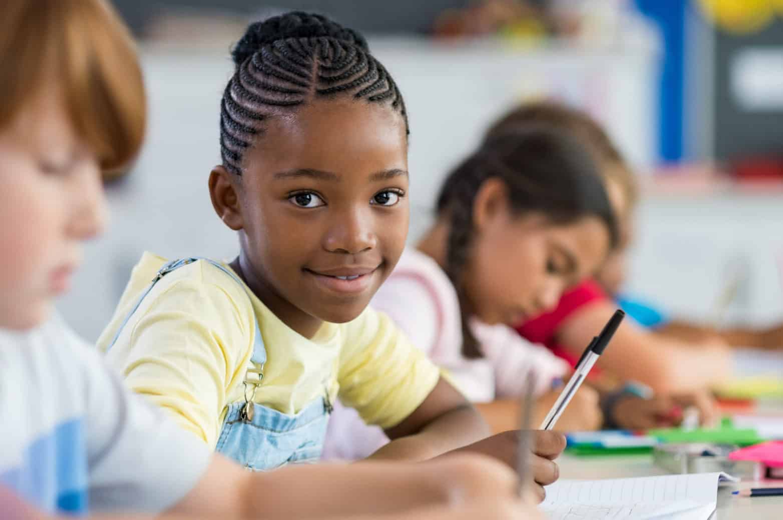 African Girl At Elementary School Peers And Pedagogy