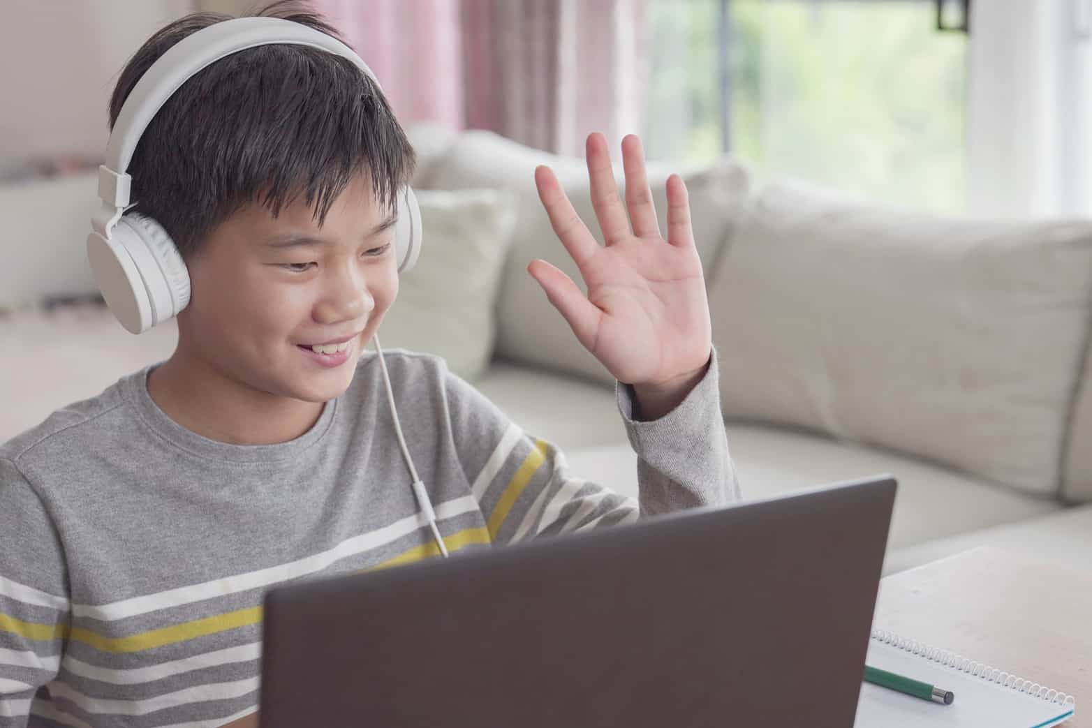 Elementary school boy having an online discussion during class.education, social distancing,homeschooling,learning remotely during covid-19 coronavirus, new